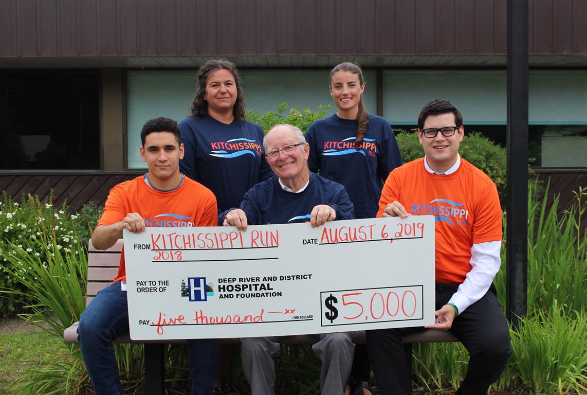 Event organizers present $5,000 donation to the DRDH Foundation from the 2018 Kitchissippi Run